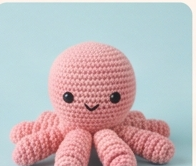 Pink crochet octopus amigurumi